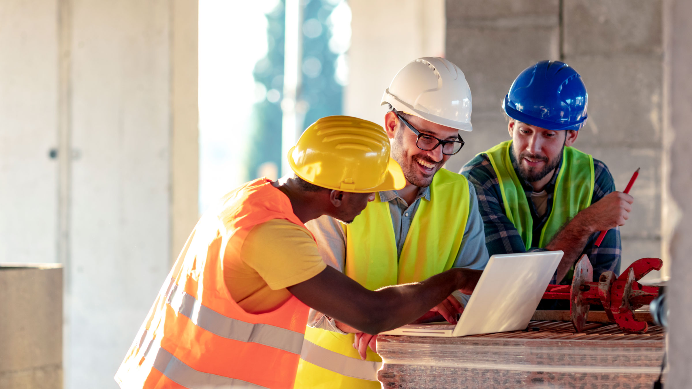 Construction workers looking at MarketPro distributor site