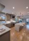 grey kitchen with recessed and undercabinet lighting